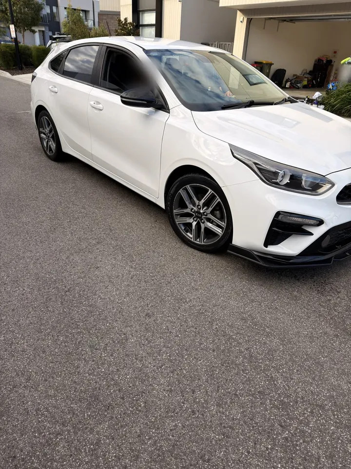 Kia Cerato after: clean white paint