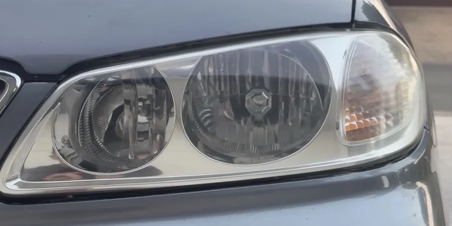 Same headlight after restoration: clear lens
