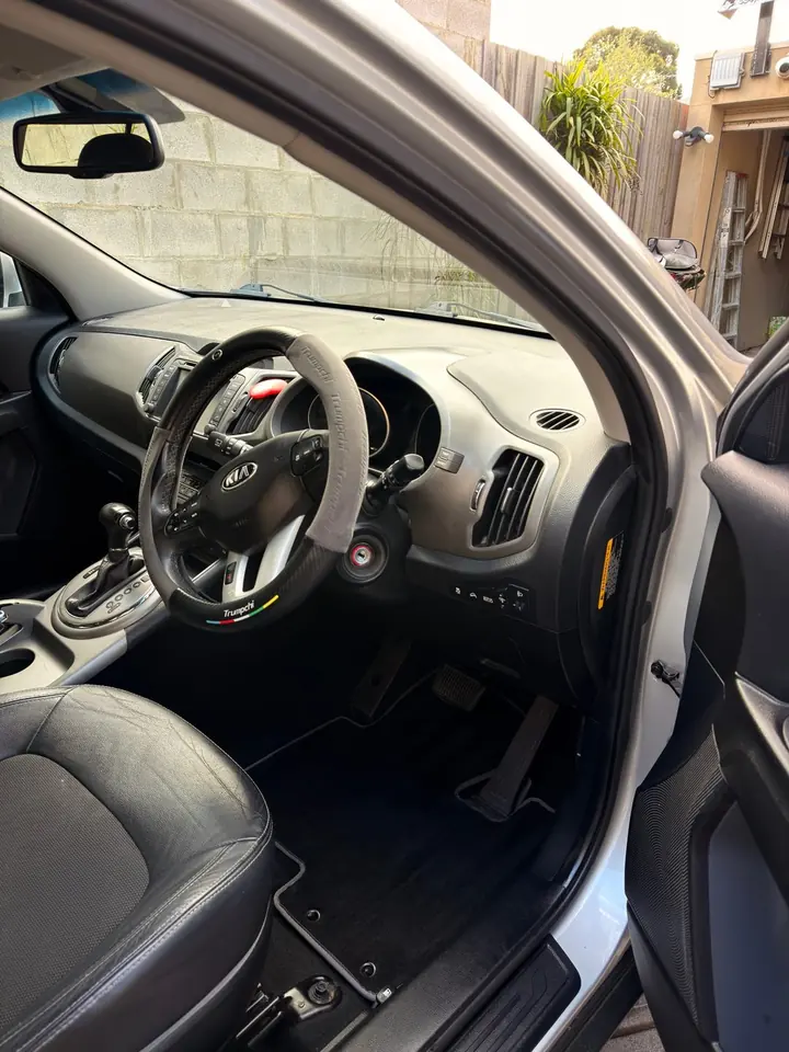 Kia Sportage after: clean driver side floor and seat