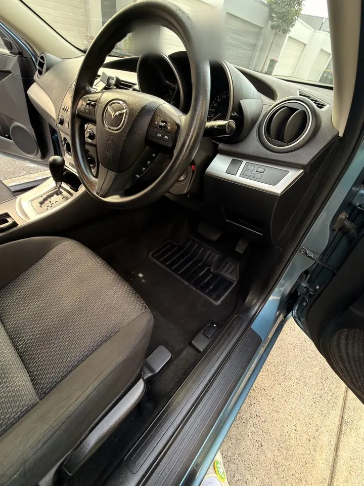 Mazda 3 after: clean driver side floor and sill