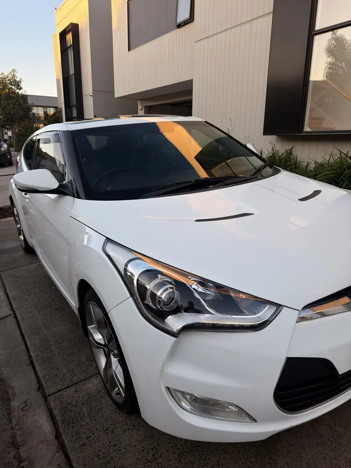 Hyundai Veloster after: clean white front end